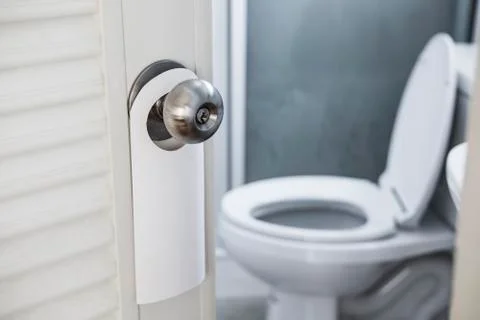 Close-up Door opened with empty hanging sign Stock Photos