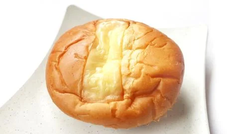 Close up of double cheese bread on plate Stock Photos