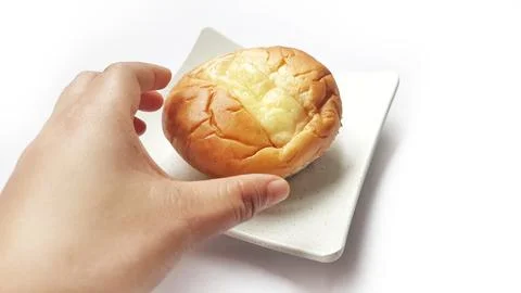 Close up of double cheese bread on plate Stock Photos
