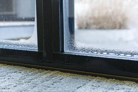 Close up of double glazed window door condensation Stock Photos