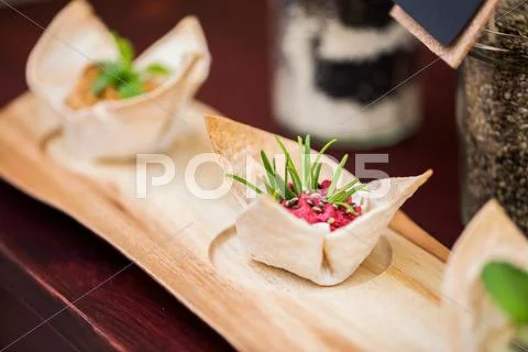 Close up of dough cornet with beetroot filling Stock Photos