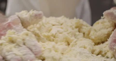 Close-up dough preparation for pasta or phyllo. Chef kneads dough with hands Stock Footage 274583731