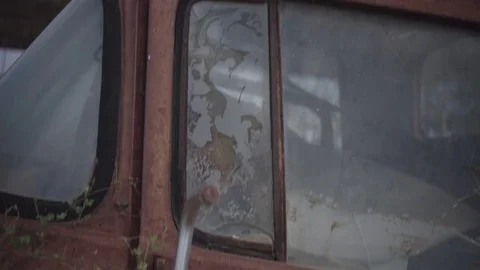 Close downwards motion rusty car Stock Footage 74021606