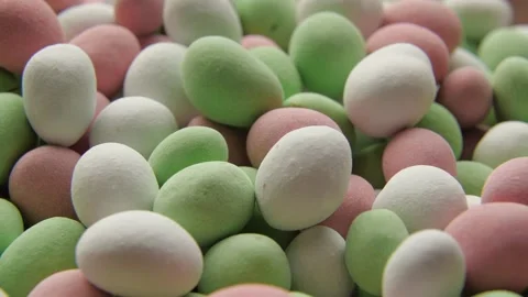 Close-up dragee on plate, pastel soft colors. The plate rotating Video stock 147266392