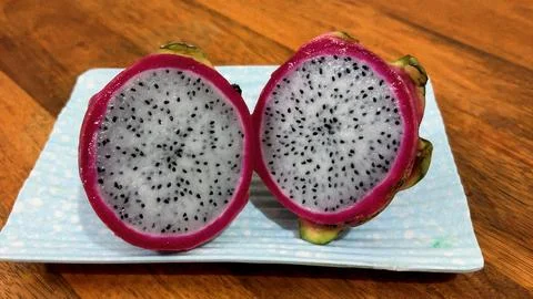Close up of dragon fruit interior with vibrant pink skin 스톡 사진