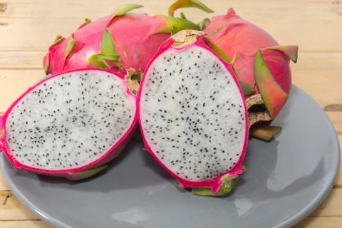 Close up dragon fruit on plate Stock Photos