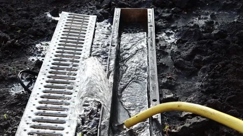Close-up of the drainage system in the garden. Stock Footage 154714694