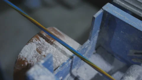 Close-up drawing of a copper colored wire in the winding, treatment with talc. Stock Footage 125828398