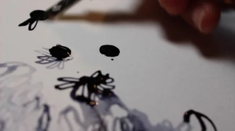 Close up Drawing Flowers with Dip Pen Using Grey Ink on Watercolor Paper Stock Footage 62765074