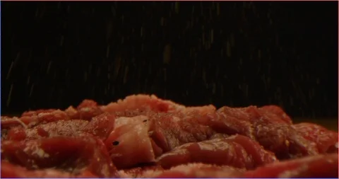 Close up of dressing beef with spices and oil, marinate meat Stock Footage 126292117