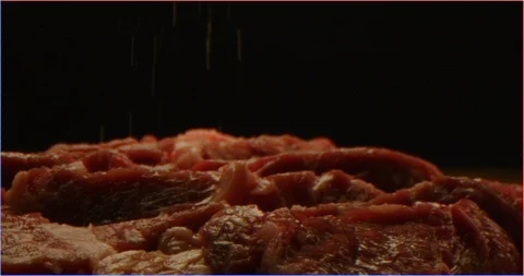 Close up of dressing beef with spices and oil, marinate meat Stock Footage 126292172