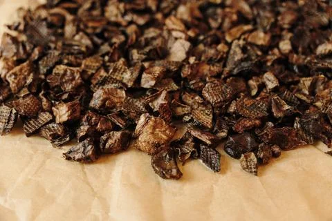 Close-up of dried beef lung pieces prepared as natural dog treats. High pro.. Stock Photos