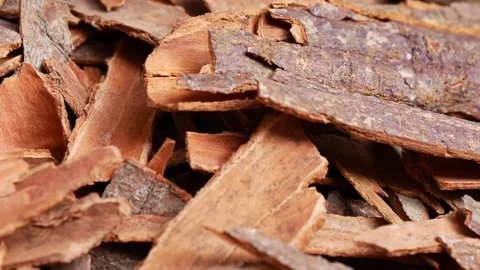 Close up of dried cinnamon bark pieces for cooking and seasoning a warm spice Stock-Footage 333031334