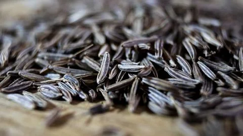 Close-up. Dried cumin seeds. Cumin spices. Culinary spices. Stock Photos