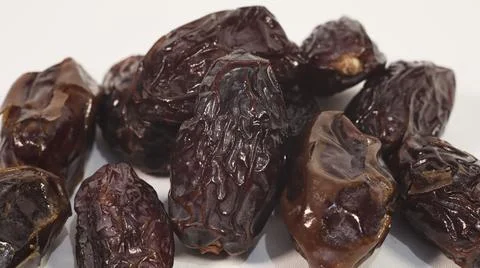 Close-Up of Dried Dates Isolated on White Background Stock Photos