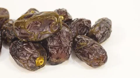 Close-Up of Dried Dates Isolated on White Background Stock Photos