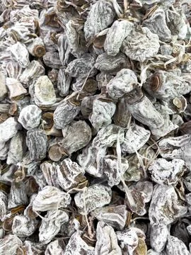Close-up of dried persimmon fruit, white powdered coating visible Stock Photos