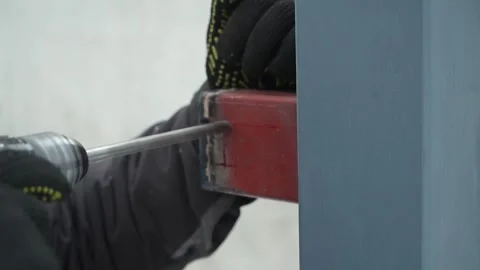 Close up of Drill bit Drilling into metal Pipe. Drilling a hole in the pipe Stock Footage 259037493