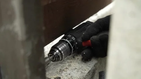 Close up of Drill bit Drilling into metal Pipe. Drilling a hole in the pipe Stock Footage 259037559