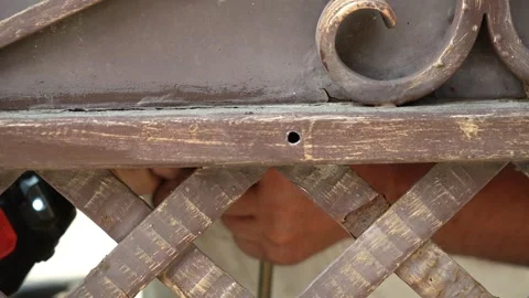 Close up of Drill bit Drilling into metal Pipe. Drilling a hole in the pipe Stock Footage 259037582