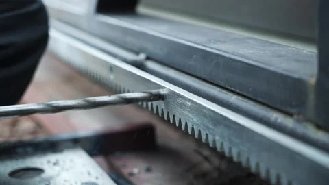 Close up of Drill bit Drilling into metal Pipe Stock Footage 263294807