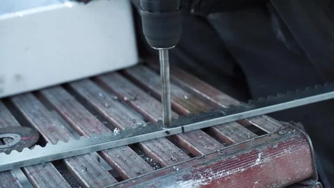 Close up of Drill bit Drilling into metal Pipe Stock Footage 263294916