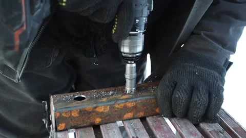 Close up of Drill bit Drilling into metal Pipe Video stock 263294920