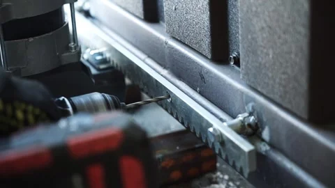 Close up of Drill bit Drilling into metal Pipe Stock Footage 263294957