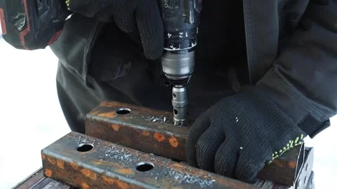 Close up of Drill bit Drilling into metal Pipe Stock Footage 263294960