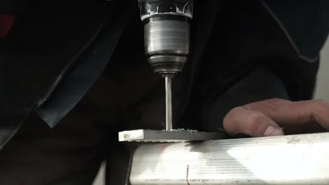 Close up of Drill bit Drilling into metal Pipe Stock Footage 266806189