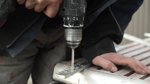Close up of Drill bit Drilling into metal Pipe Stock Footage 266806191