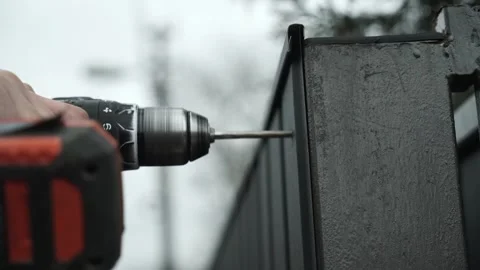 Close up of Drill bit Drilling into metal Pipe Stock Footage 266806312