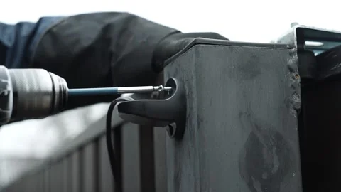 Close up of Drill bit Drilling into metal Pipe Stock Footage 269495299