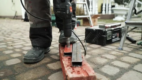 Close up of Drill bit Drilling into metal Pipe Stock Footage 274530413