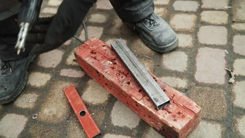 Close up of Drill bit Drilling into metal Pipe Stock Footage 274530419