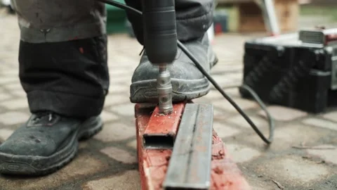 Close up of Drill bit Drilling into metal Pipe Stock Footage 274530422