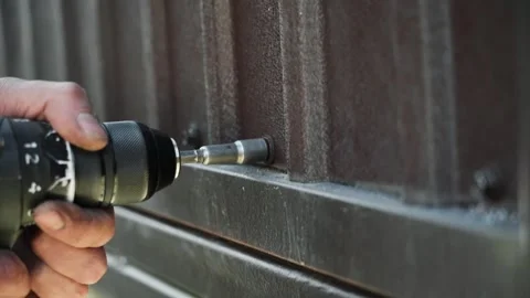 Close up of Drill bit Drilling into metal Pipe Stock Footage 274530439