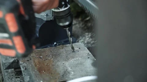 Close up of Drill bit Drilling into metal Pipe Stock Footage 274530458