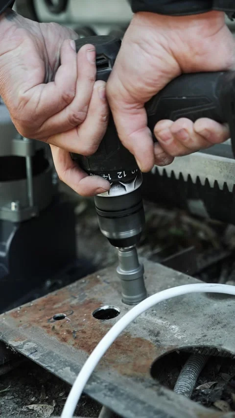 Close up of Drill bit Drilling into metal Pipe Stock-Footage 274530466