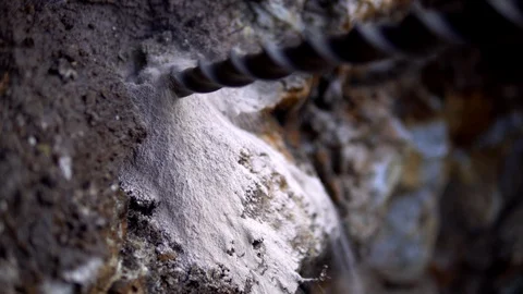 Close up of drill going into rock Video stock 100802659