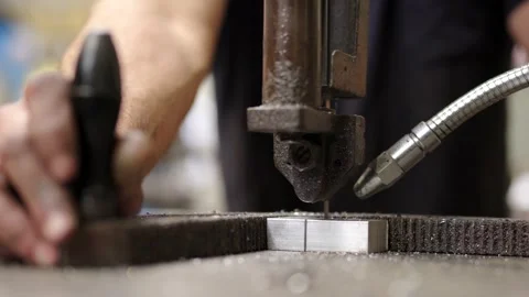 Close-up of a drill performing on a metal piece Stock Footage 258181282