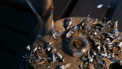 Close-up of drilling machining process in metal part on a lathe, manufacturing Video stock 118437187