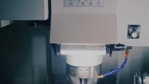 Close Up of Drilling Operation on a CNC Machine Stock Footage 104769868
