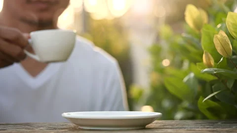 Close-up drink hot coffee with steaming of coffee or tea cup, slow motion Stock-Footage 143278344