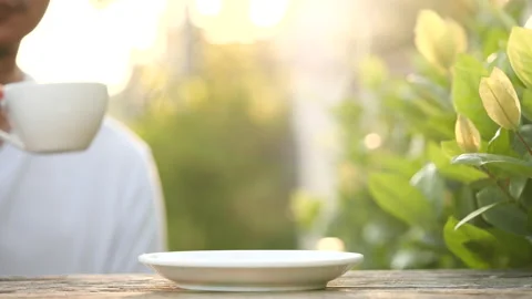 Close-up drink hot coffee with steaming of coffee or tea cup, slow motion Stock-Footage 143279518