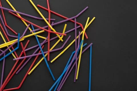 Close up of drinking straw on black background Foto stock