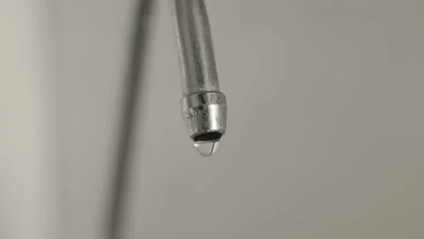 Close-up, drinking water dripping from a broken kitchen faucet Stock Footage 225310787