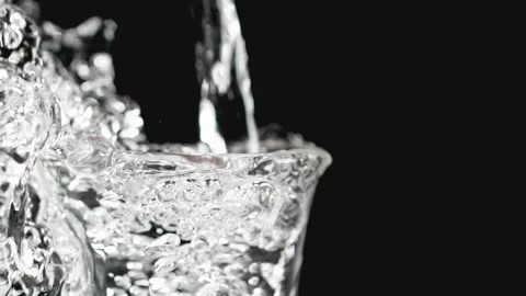 Close-up drinks are poured into the glass Stock Footage 234190871