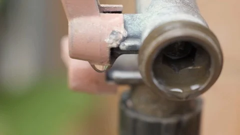 Close-up of a dripping tap Stock Footage 116961686
