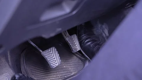 Close-up of The Driver's foot Pressing The Pedals Of A Manual Car 動画素材 286006593